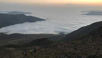 North-Damavand-clouds-tourists-descend