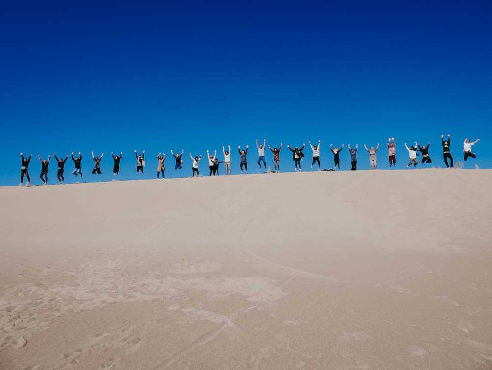 a group of tourists maranjab desert